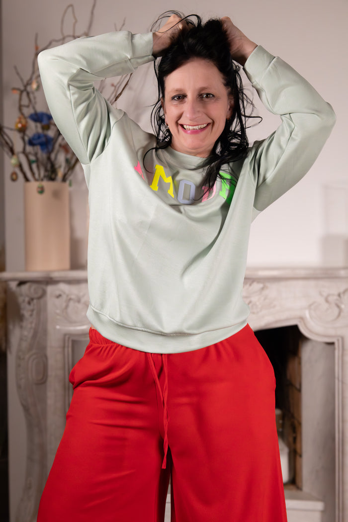 Maglia Amore Dolce – mint sweater met print in casual outfit voor een stijlvolle look.